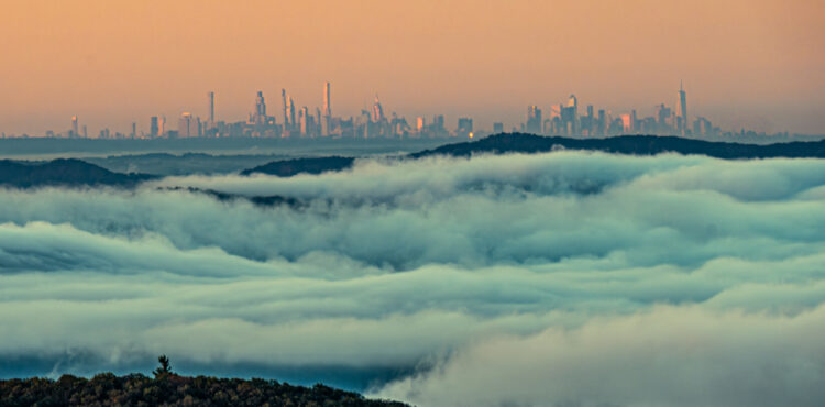 Photo of Evaporation Fog above the Hudson River and covering the Hudson Valley with New York City in the background.