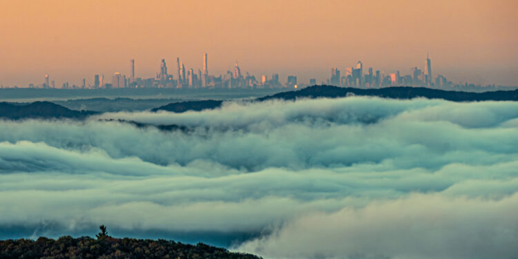 Photo of Evaporation Fog above the Hudson River and covering the Hudson Valley with New York City in the background.